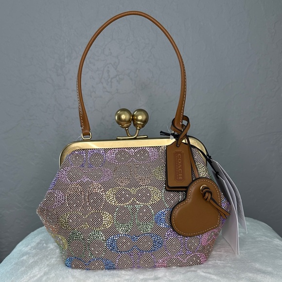 Coach Handbags - Coach Kisslock Frame Bag In Crystal Signature Jacquard